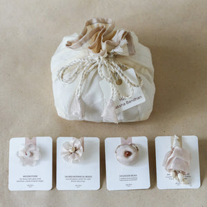 Silver Glow Potli Set (3 Rakhis, 1 Lumba)