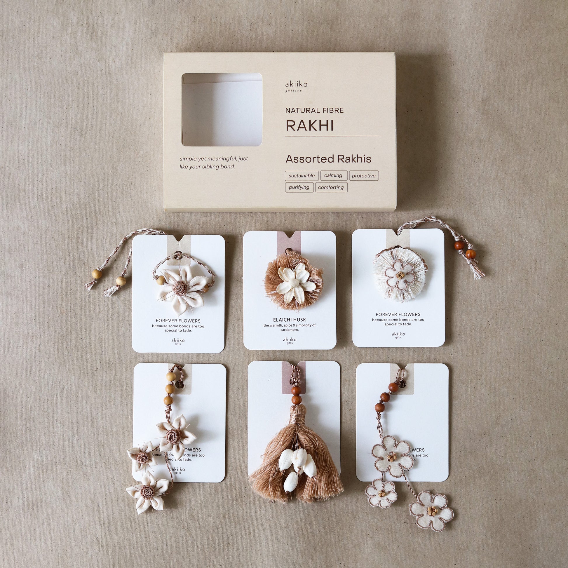 Jasmine Twirl Rakhi Trio (2 rakhis, 1 lumba)