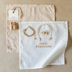 Table for Two: Linens & Rakhi Gift Set