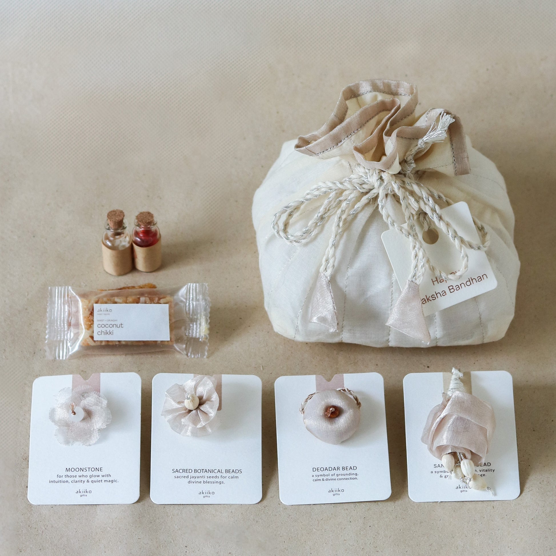 Silver Glow Potli Set (3 Rakhis, 1 Lumba)