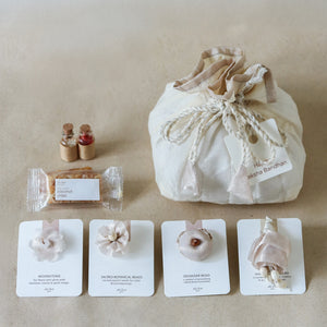 Silver Glow Potli Set (3 Rakhis, 1 Lumba)