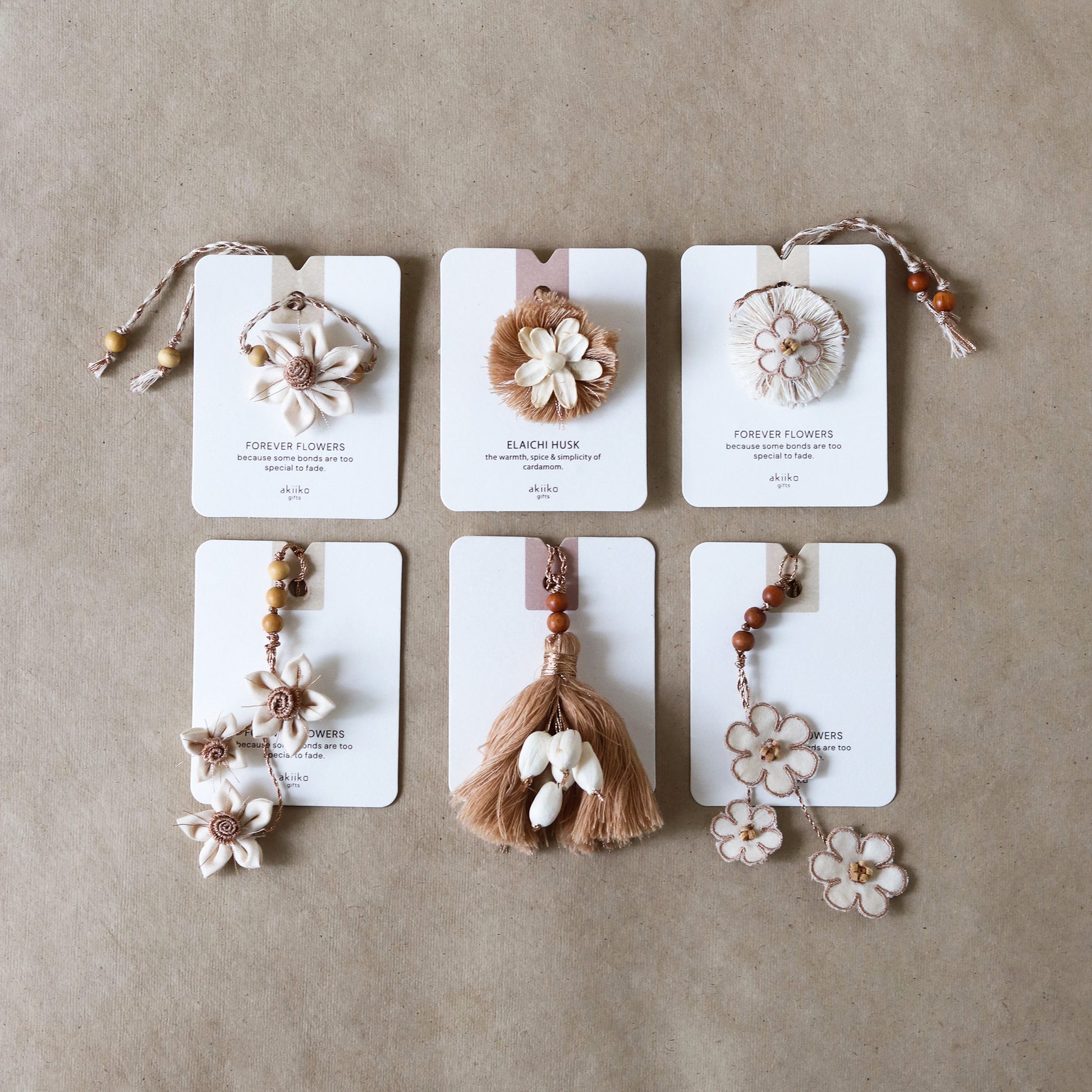 Jasmine Twirl Rakhi Trio (2 rakhis, 1 lumba)