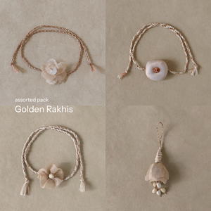 Golden Glow Potli Set (3 Rakhis, 1 Lumba)