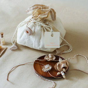 Golden Glow Potli Set (3 Rakhis, 1 Lumba)