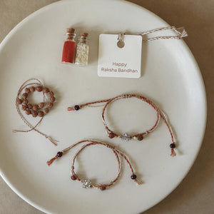 Divine Charm Rakhi Trio (3 Rakhis)