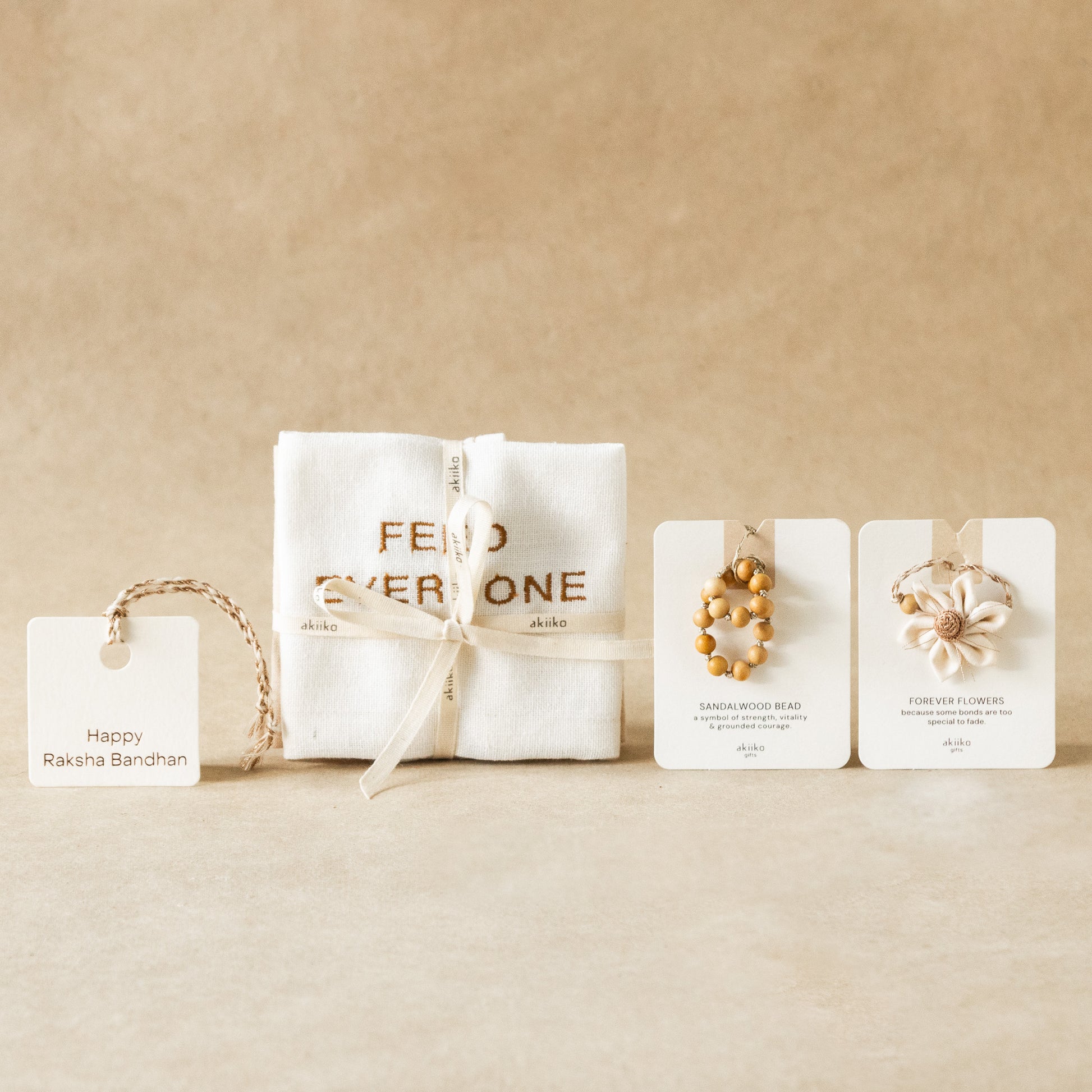 Table for Two: Linens & Rakhi Gift Set