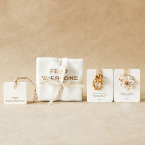 Table for Two: Linens & Rakhi Gift Set