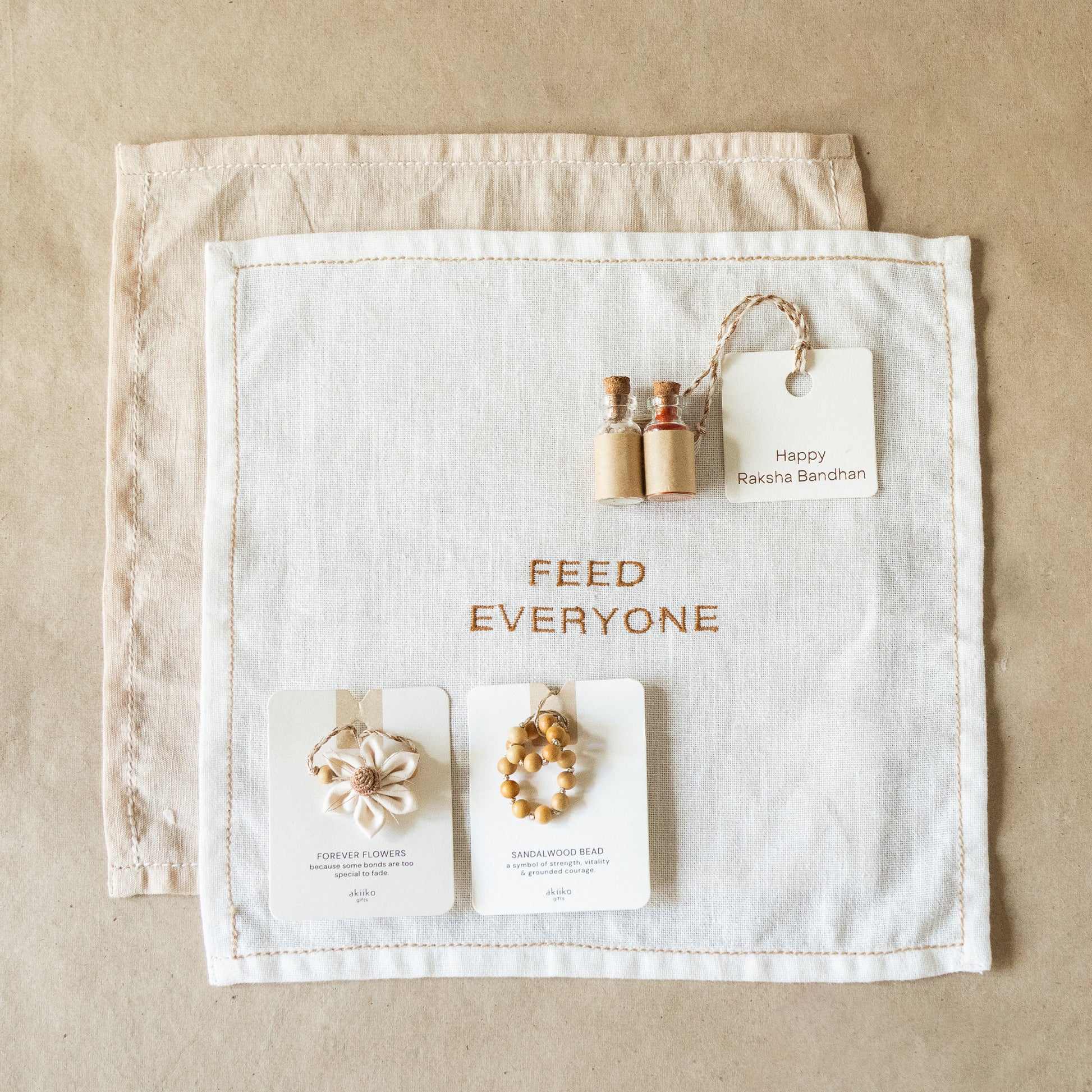 Table for Two: Linens & Rakhi Gift Set