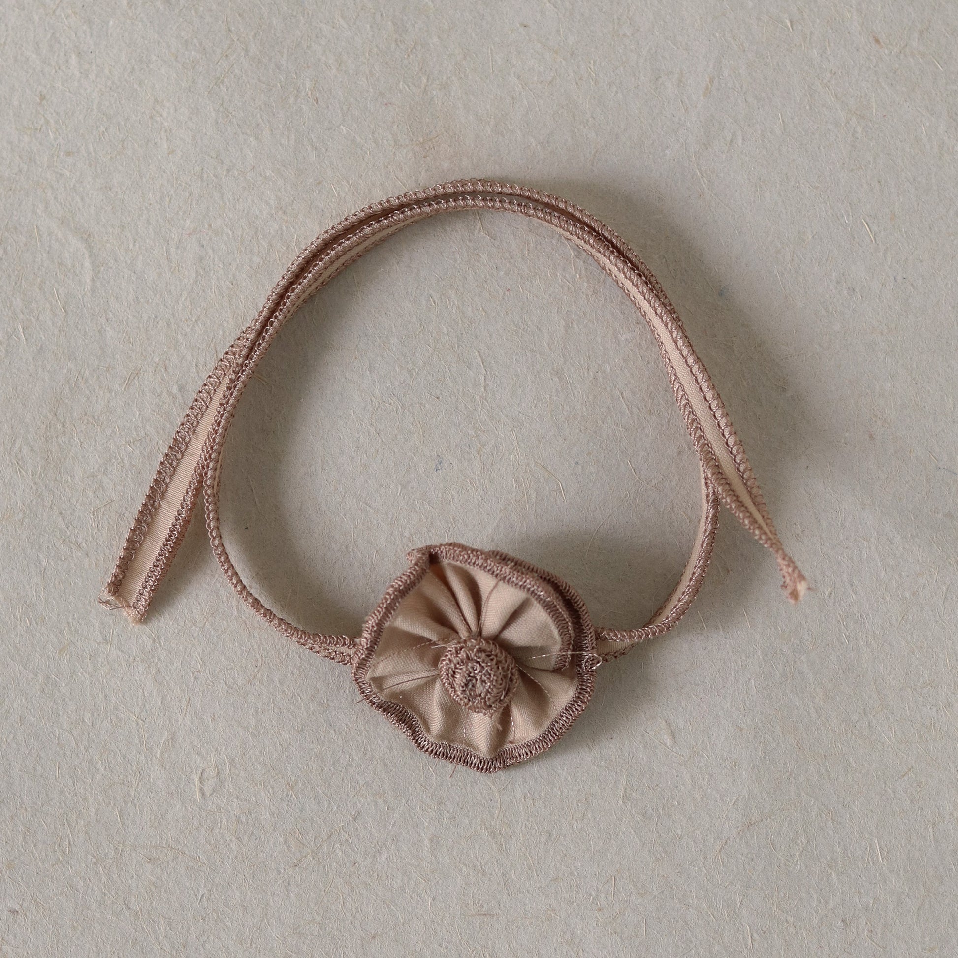 Rose Gold Ruffled Flower Rakhi