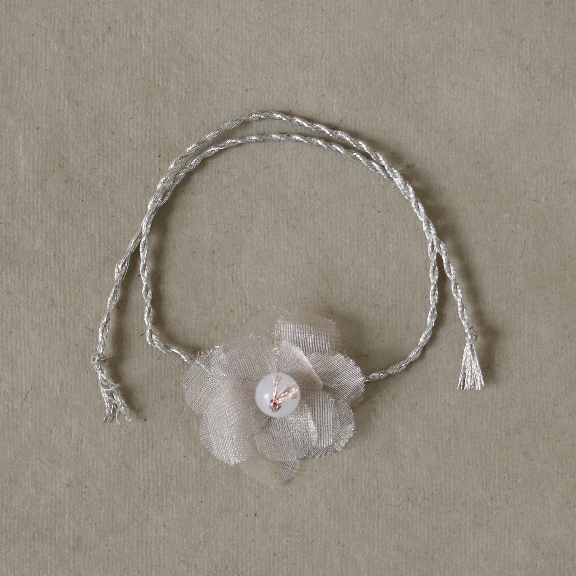 Moonstone Floral Lustre Rakhi  - Silver