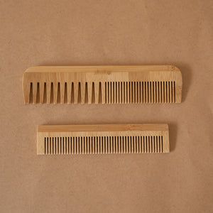 Set of 2 bamboo combs including a pocket comb and a regular comb for gentle detangling and styling.