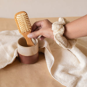 Cloud PM Routine set featuring a soft terry hand towel, plush scrunchie, and eco-conscious bamboo hair brush for nighttime self-care.