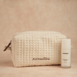 Daily Deo Kit featuring Necessary White Musk aluminum-free deodorant and a waffle-woven cotton pouch with espresso embroidery and zipper accents.