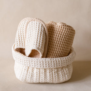 Honey Milk Waffle Bath Club set featuring a large waffle storage basket, soft waffle bath towel, and cushioned waffle slippers.