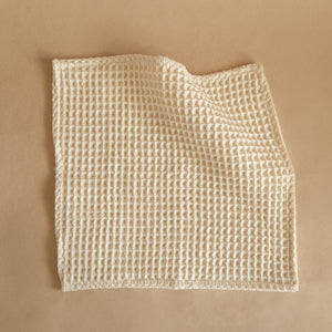 Set of four pique waffle cotton face towels, 30x30 cm, soft, plush, and absorbent with textured weave.