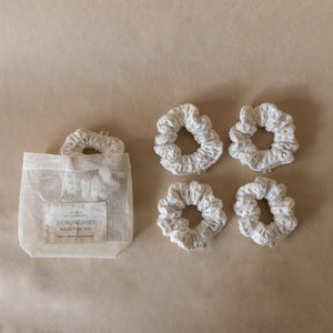 Pack of five wheat-colored pique waffle skinny scrunchies, made from soft stretchy cotton, perfect for hair or wrist accessory.