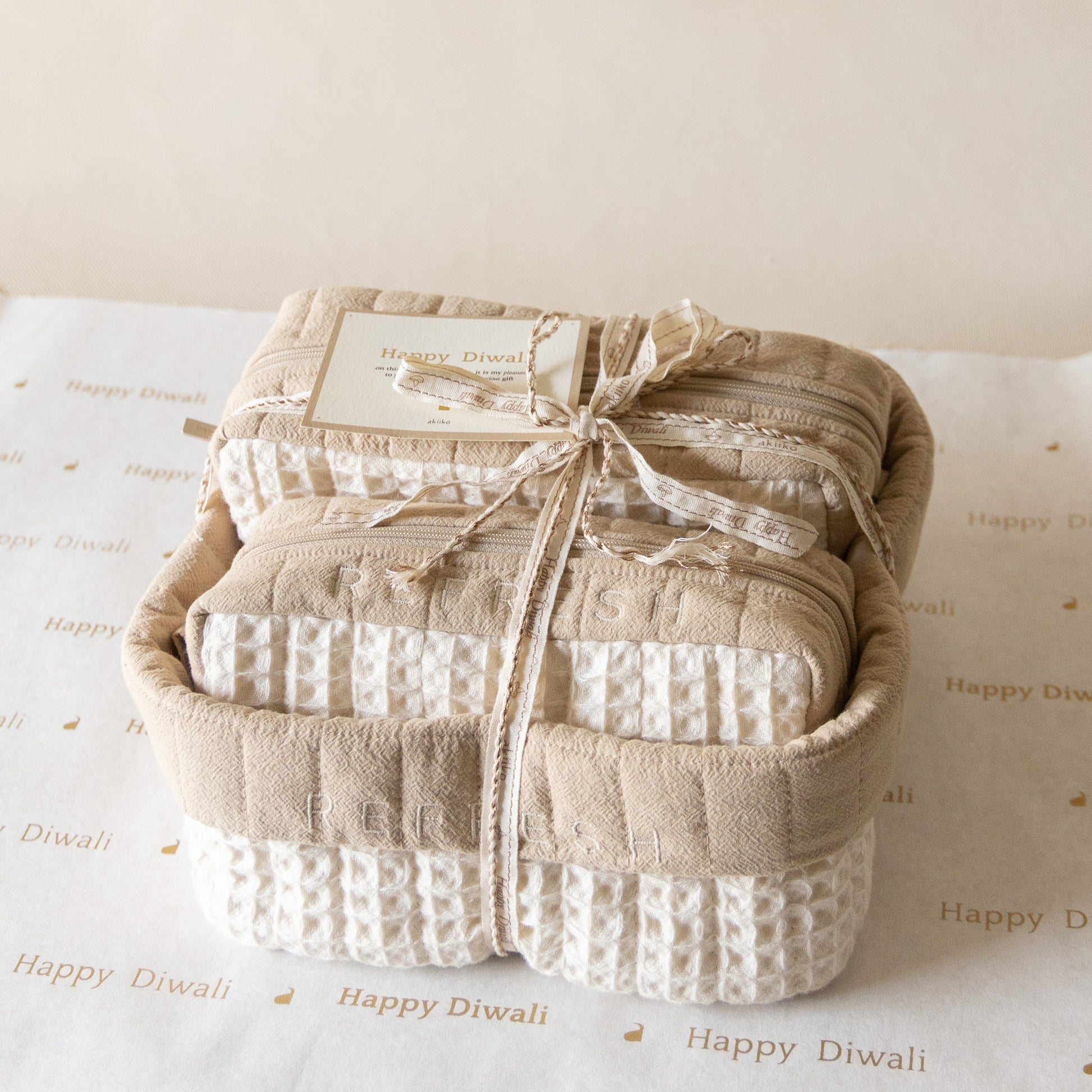 Refresh Waffle Pouch Set featuring a large waffle-crinkle foldover basket embroidered with “REFRESH” and matching small and medium waffle pouches in wheat and natural shades.