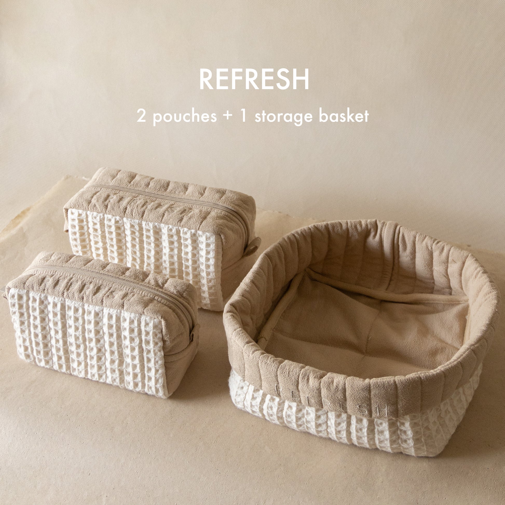 Refresh Waffle Pouch Set featuring a large waffle-crinkle foldover basket embroidered with “REFRESH” and matching small and medium waffle pouches in wheat and natural shades.