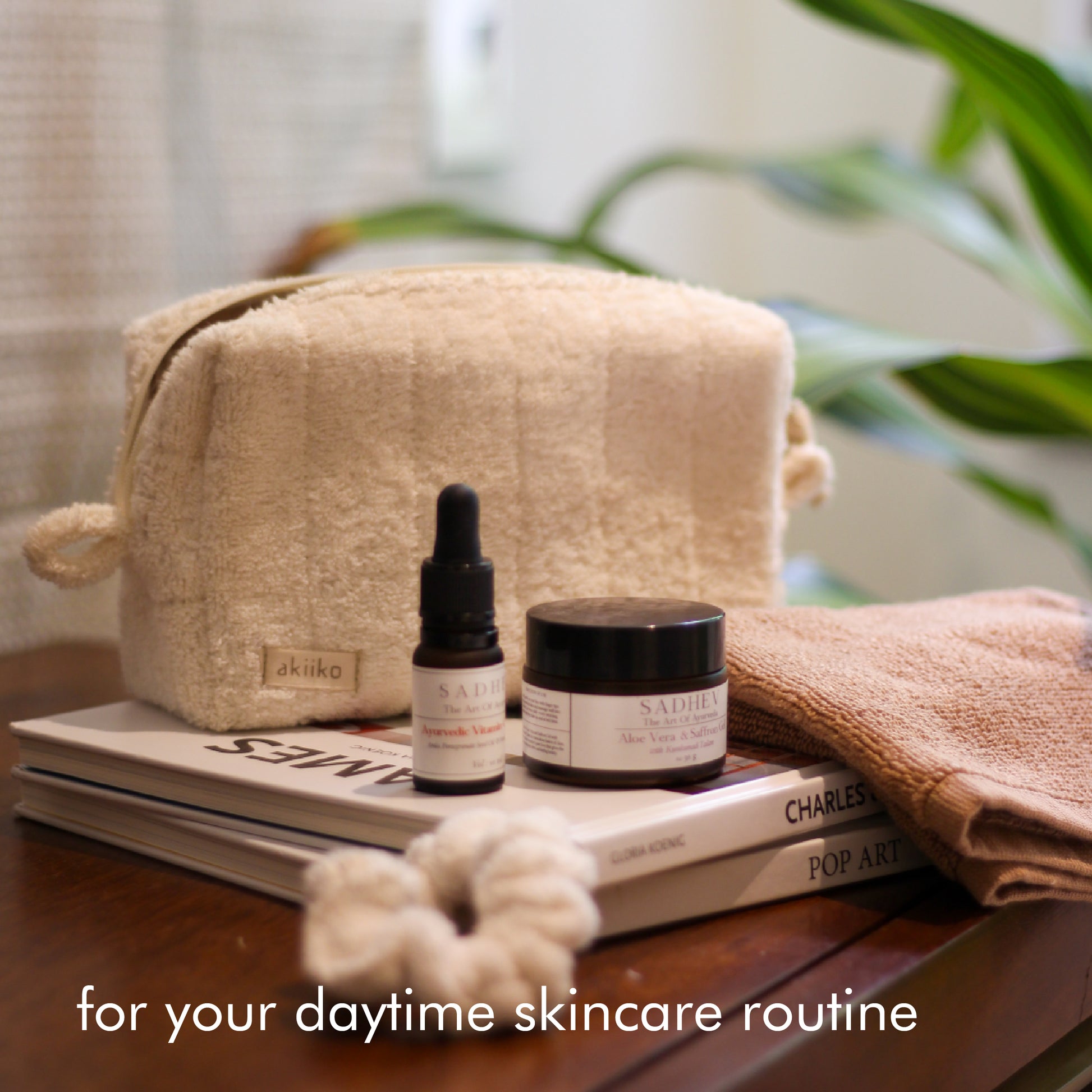 Rise Softly AM Skincare Routine set featuring vitamin C serum, aloe vera gel, ivory terry pouch and scrunchie, and a pecan soft terry face towel.