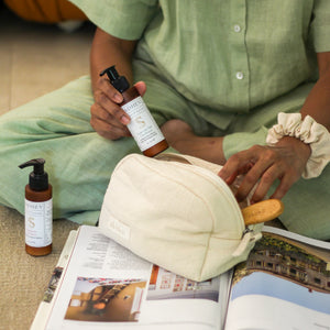 Roots & Rituals Hair Care Set featuring Ayurvedic shampoo and conditioner, bamboo hair brush, crinkle scrunchie, and curl pouch.