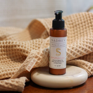 Soak & Soothe Bath Kit featuring Ayurvedic shower gel, body lotion, waffle luffa scrubber, latte waffle bath towel, cozy bath slippers, and a waffle storage basket.