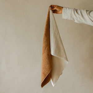 Pack of two soft terry cotton hand towels with zero-twist texture, plush and highly absorbent.