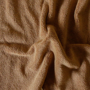 Pack of two soft terry cotton hand towels with zero-twist texture, plush and highly absorbent.