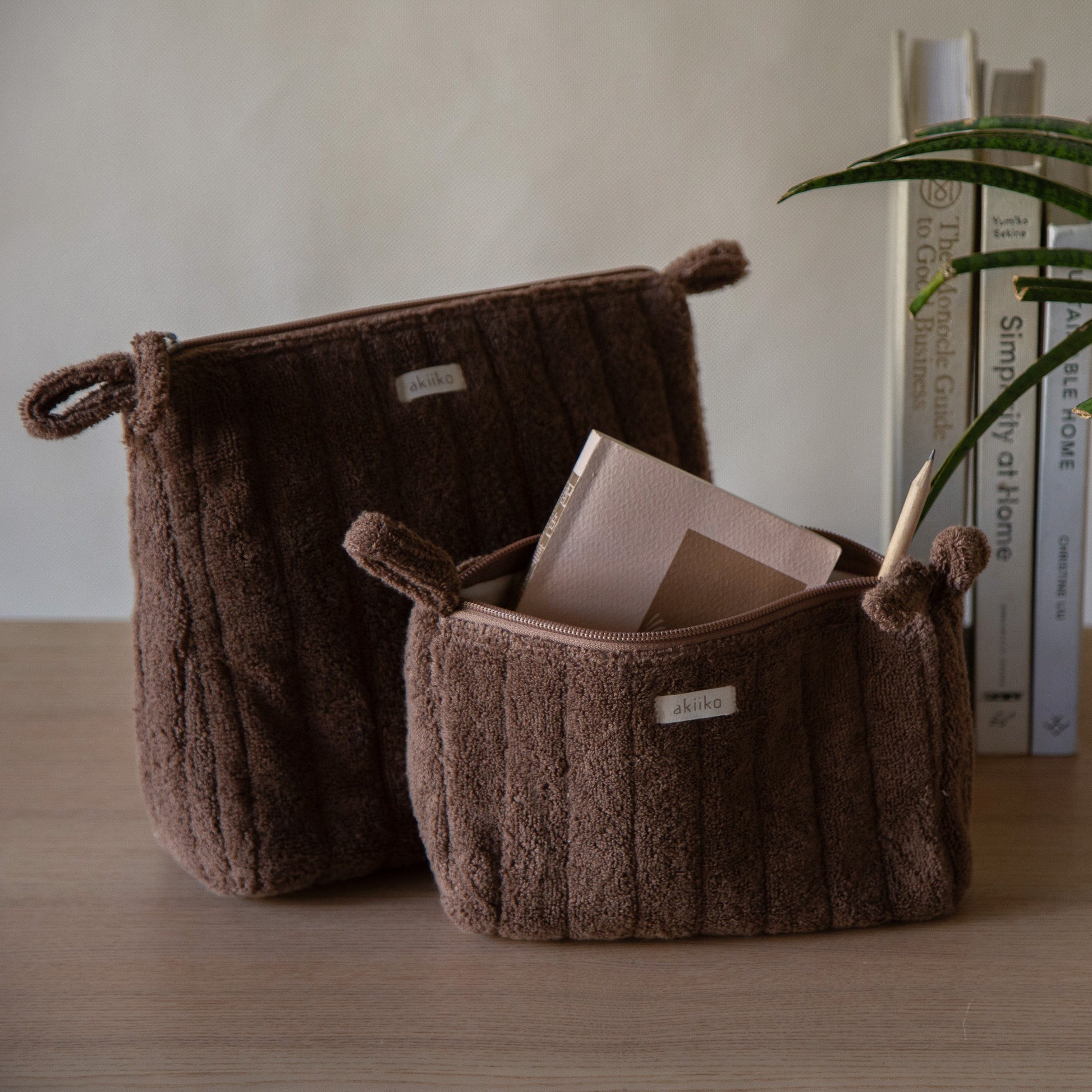 Cloud Triangle Pouches set in three sizes standing on a counter