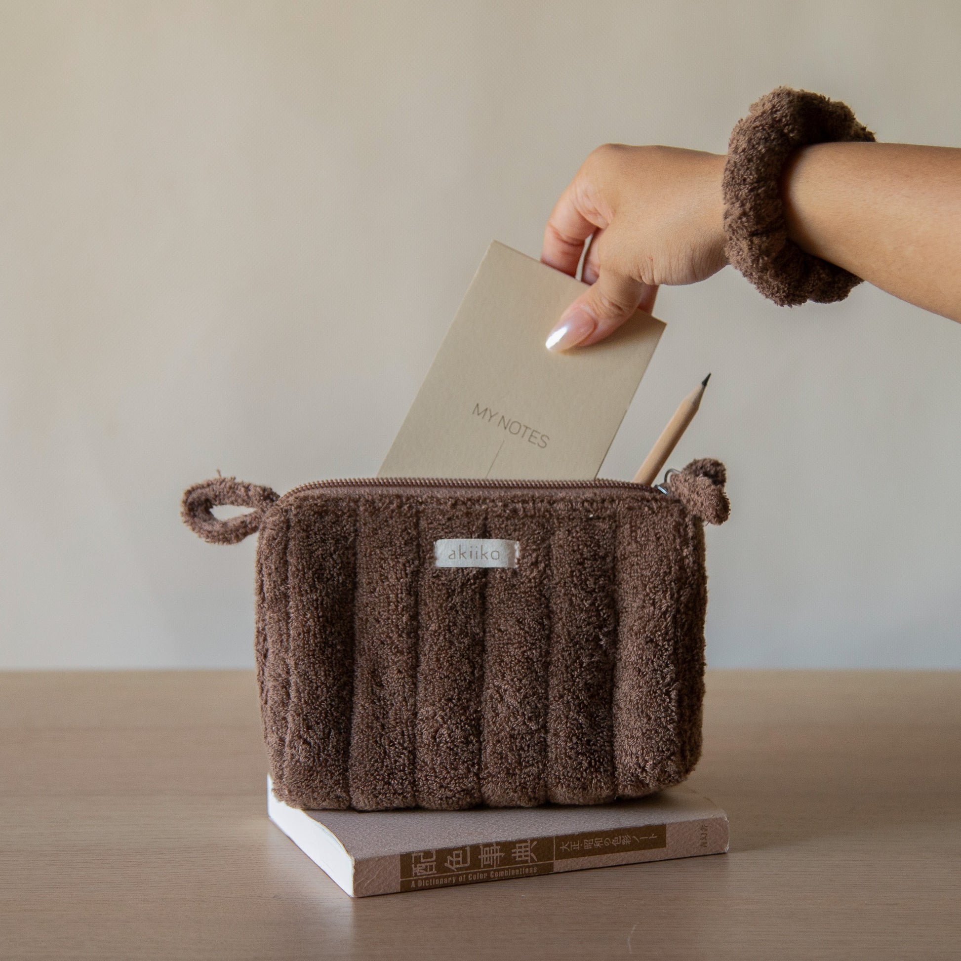 Cloud Triangle Pouches set in three sizes standing on a counter