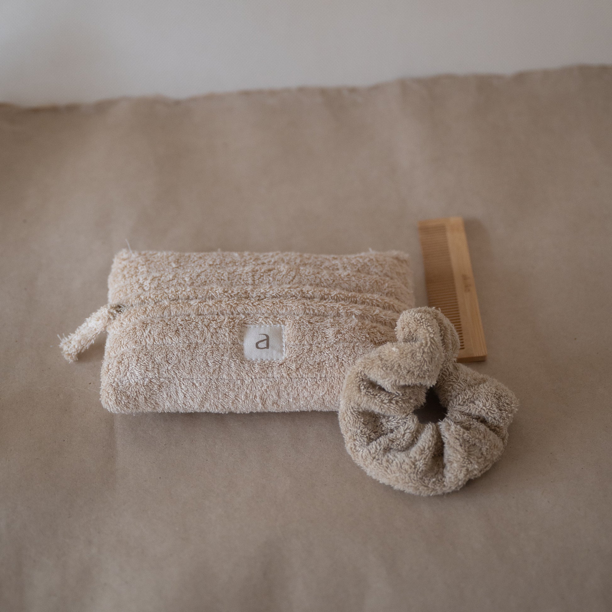 Set of three cloud-inspired cotton terry rectangle pouches, front view