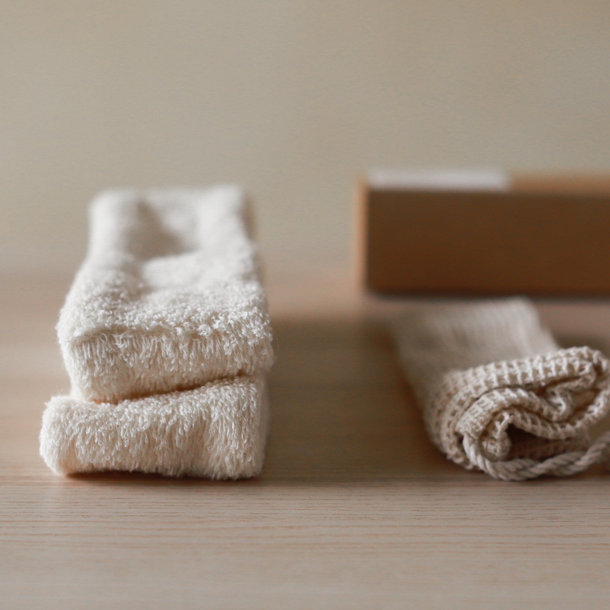 Set of two soft terry cotton headbands, plush and stretchy, designed for comfortable hair styling or skincare routines.