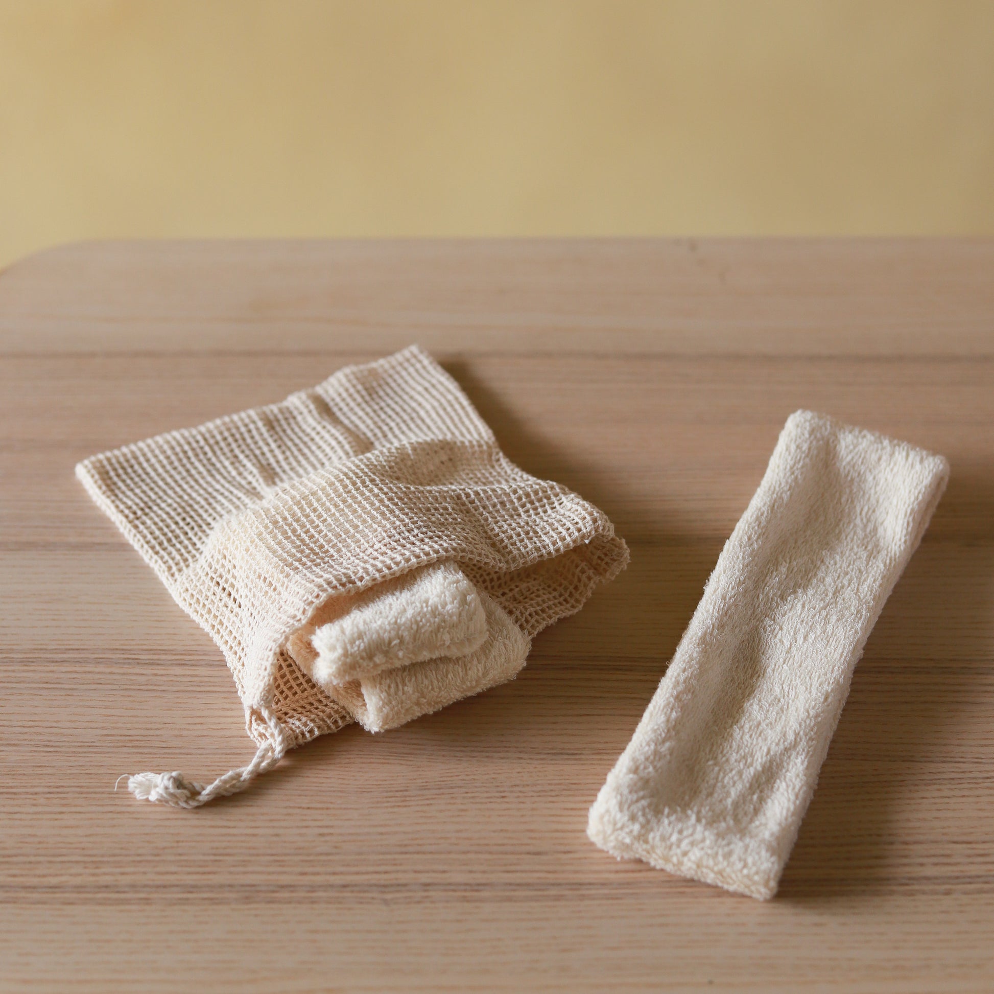 Set of two soft terry cotton headbands, plush and stretchy, designed for comfortable hair styling or skincare routines.