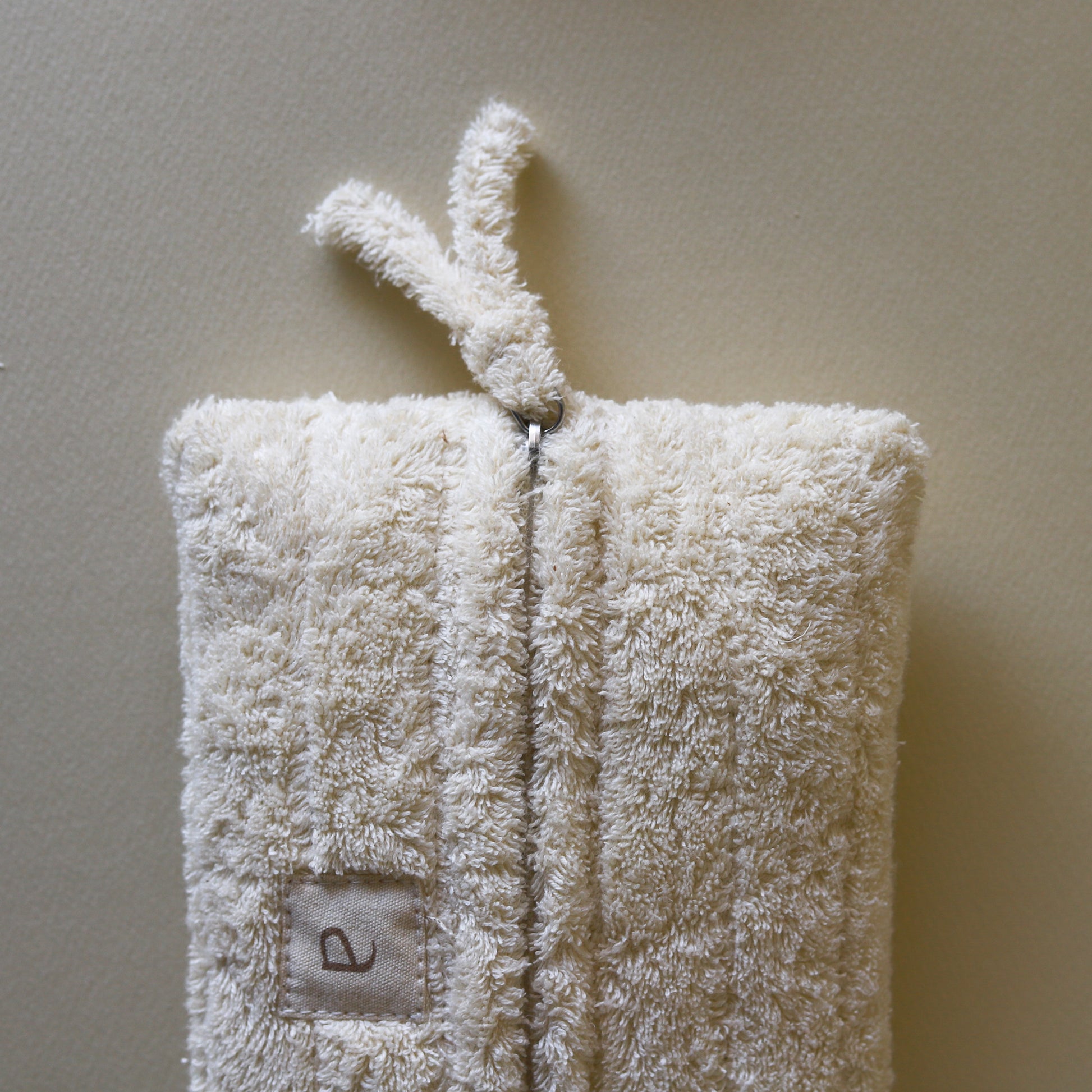 Set of three cloud-inspired cotton terry rectangle pouches, front view