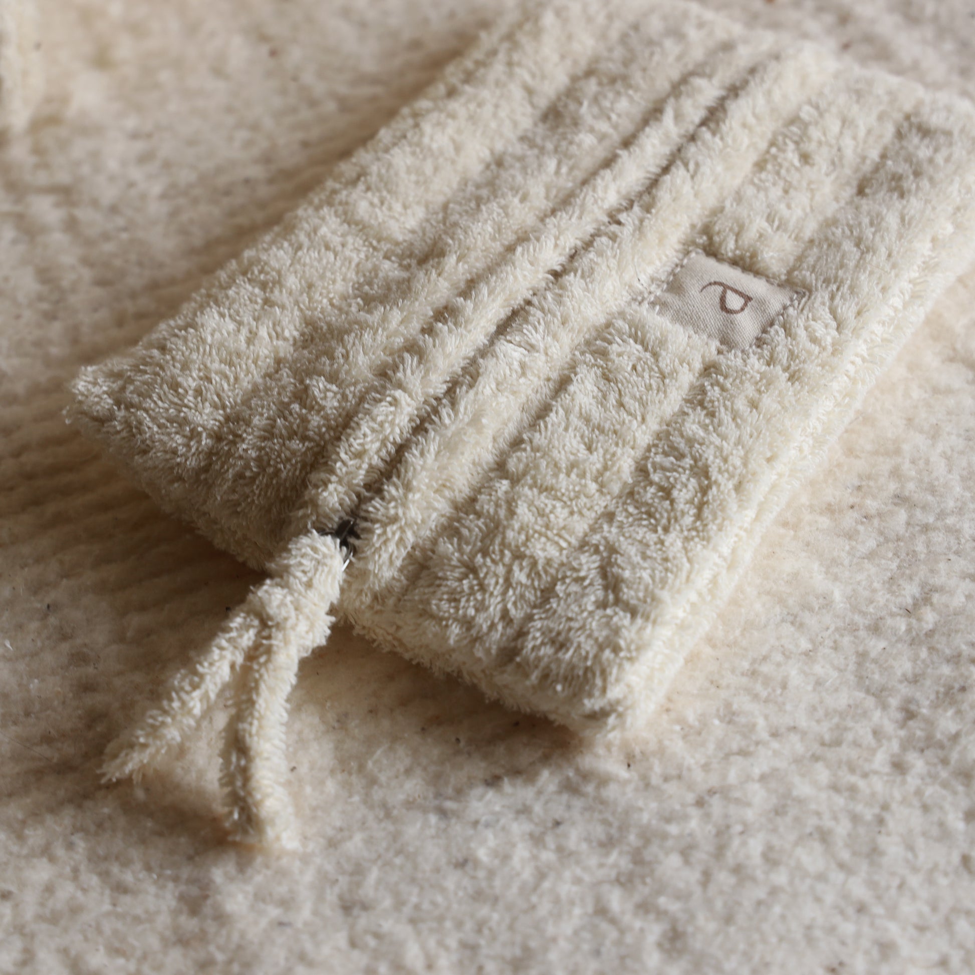 Set of three cloud-inspired cotton terry rectangle pouches, front view